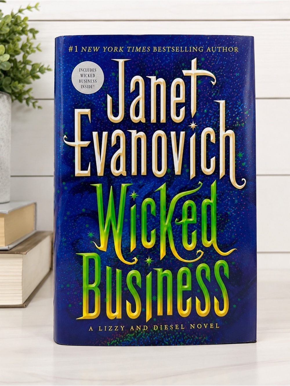 Janet Evanovich "Wicked Business" Hardcover - Blue/Green Holographic Cover